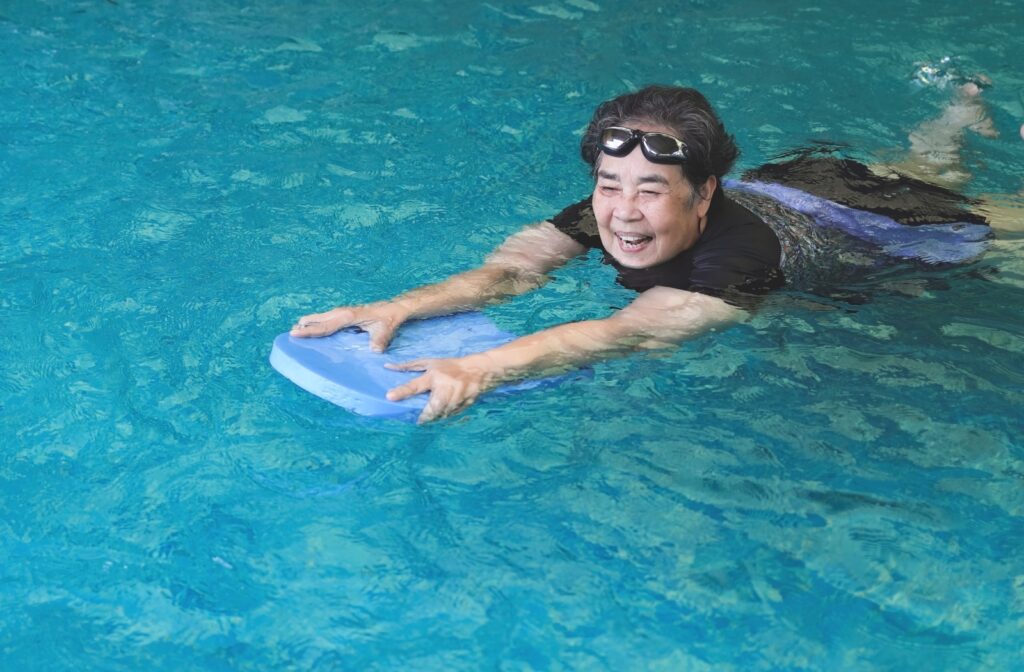 Older woman swimming.